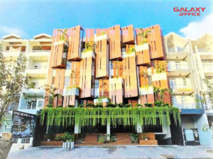 Khung cảnh bên ngoài Awada Building với thiết kế sáng tạo và cây cảnh.